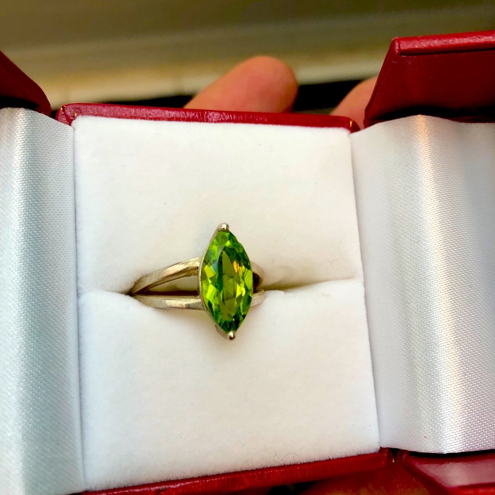 Sterling silver and genuine peridot ring.